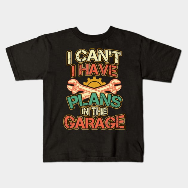 I Cant I Have Plans in the Garage Kids T-Shirt by aneisha